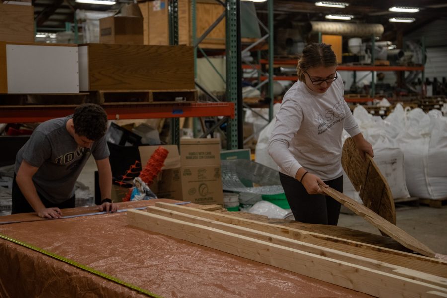 Students work on the concrete canoe project for the ASCE club in the Hydraulics Annex in Coralville on Wednesday, Dec. 1, 2021. 