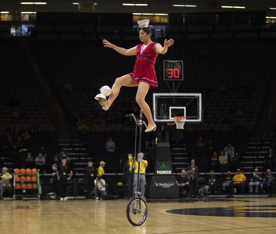 Red Panda performs a halftime show. Red Panda flipped bowls during a women’s basketball game between No. 9 Iowa and Michigan State at Carver-Hawkeye Arena in Iowa City on Sunday Dec. 5, 2021. The Hawkeyes defeated the Trojans, 88-61. (Dimia Burrell/The Daily Iowan)