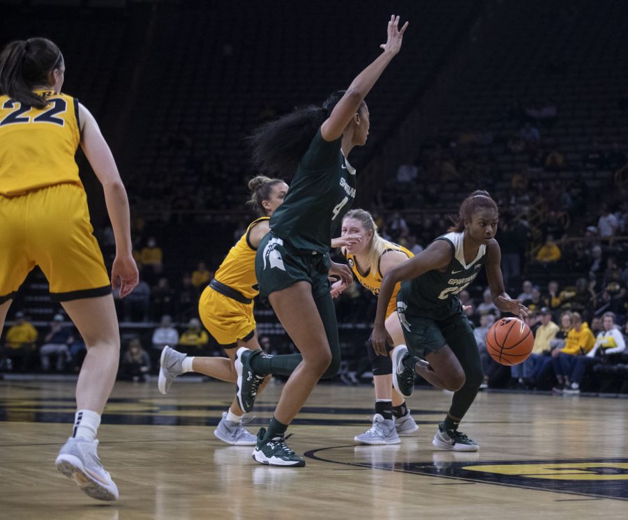 Michigan State guard Nia Clouden drives to the basket. Clouden finished with 18 points, leading the scoring for the Trojans during a women’s basketball game between No. 9 Iowa and Michigan State at Carver-Hawkeye Arena in Iowa City on Sunday, Dec. 5, 2021. The Hawkeyes defeated the Trojans, 88-61. (Dimia Burrell/The Daily Iowan)