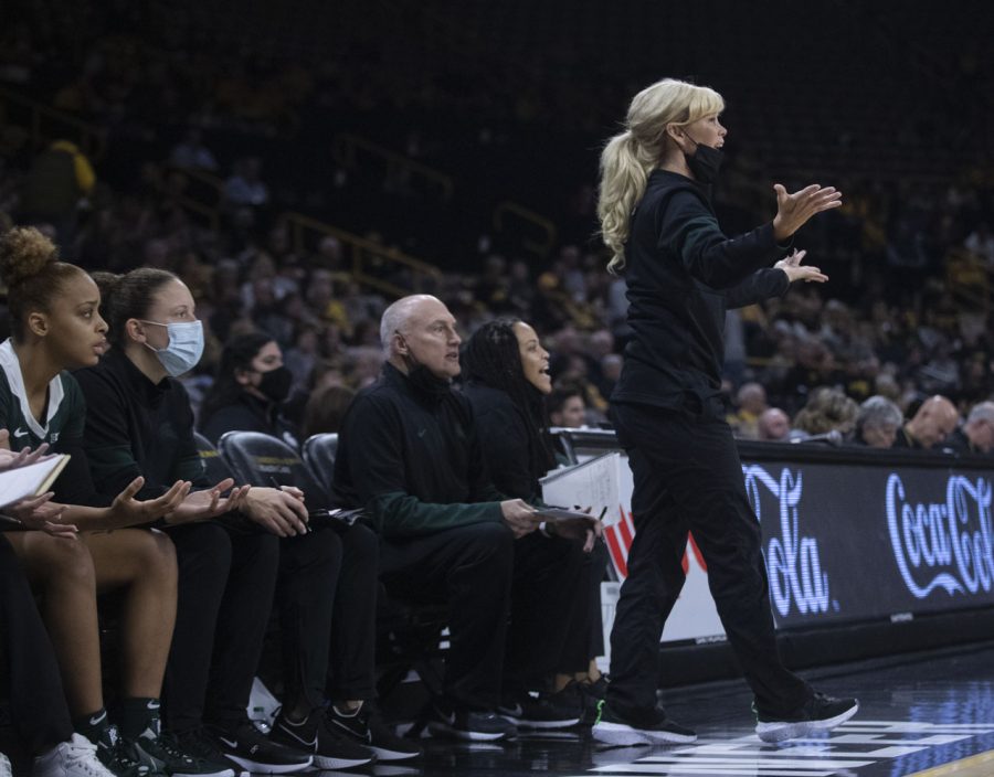 Michigan State head coach yells to the referee about a foul called against Michigan State. The Hawkeyes and the Trojans both finished with 17 personal fouls during a women’s basketball game between No. 9 Iowa and Michigan State at Carver-Hawkeye Arena in Iowa City on Sunday Dec. 5, 2021. The Hawkeyes defeated the Trojans 88-61. (Dimia Burrell/The Daily Iowan)