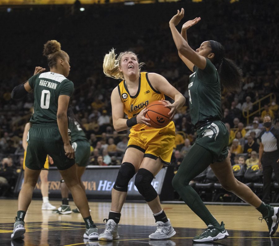 Iowa forward Monika Czinano looks to attempt a lay up. Czinano finished with 19 points during a women’s basketball game between No. 9 Iowa and Michigan State at Carver-Hawkeye Arena in Iowa City on Sunday Dec. 5, 2021. The Hawkeyes defeated the Trojans, 88-61. 