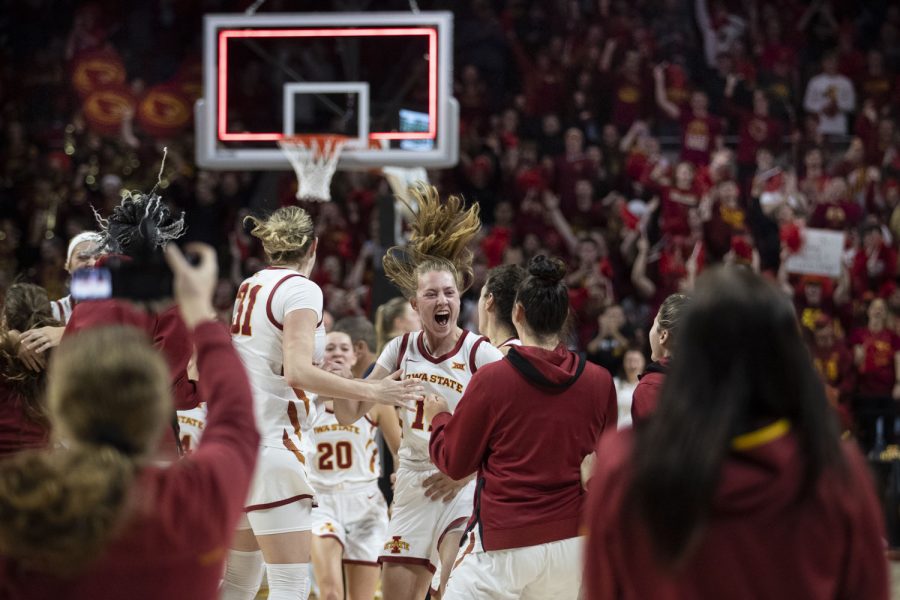 Iowa State celebrates their win after a women’s basketball game between No. 12 Iowa and No. 15 Iowa State at Hilton Coliseum in Ames, Iowa, on Wednesday, Dec. 8, 2021. The Cyclones defeated the Hawkeyes 77-70. Iowa State is now 9-1. 