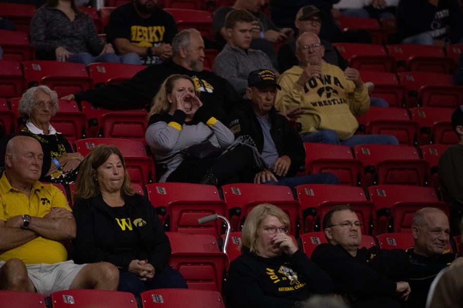 Iowa fans cheer from the stands during the first day of the National Collegiate Duals at Raider Arena at Northwest Florida State College in Niceville, FL on Monday, Dec. 20, 2021. The Hawkeyes defeated Central Michigan 44-0 and Lehigh 28-7. 