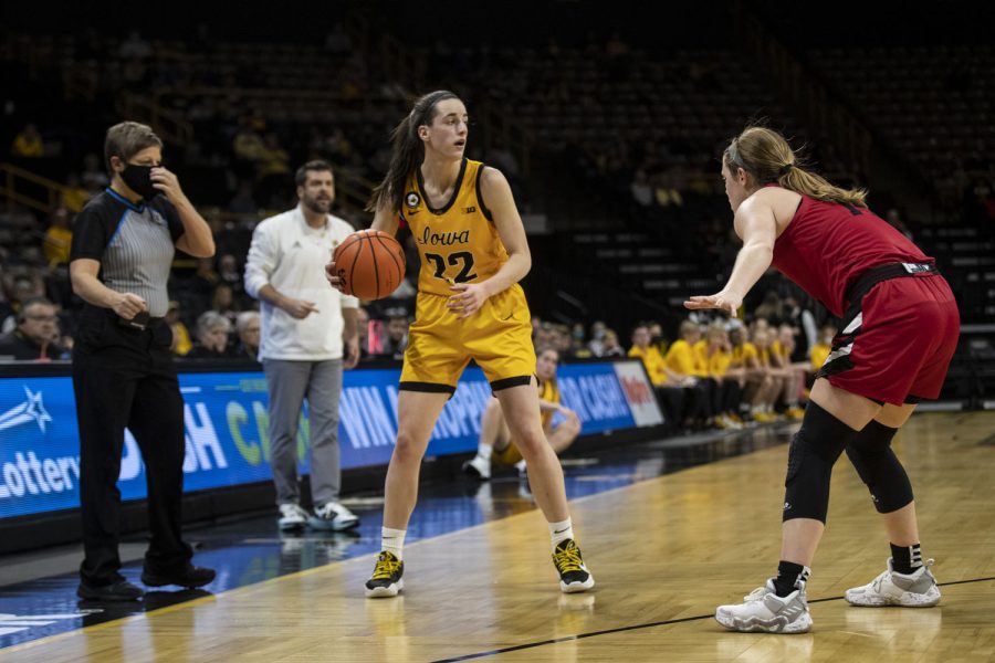 Iowa+guard+Caitlin+Clark+looks+to+pass+during+a+women%E2%80%99s+basketball+game+between+No.+15+Iowa+and+Indiana+University-Purdue+University+at+Carver-Hawkeye+Arena+in+Iowa+City+on+Tuesday%2C+Dec.+21%2C+2021.+The+Jaguars+defeated+the+Hawkeyes%2C+74-73.+Clark+played+for+a+total+of+33+minutes+and+49+seconds.+