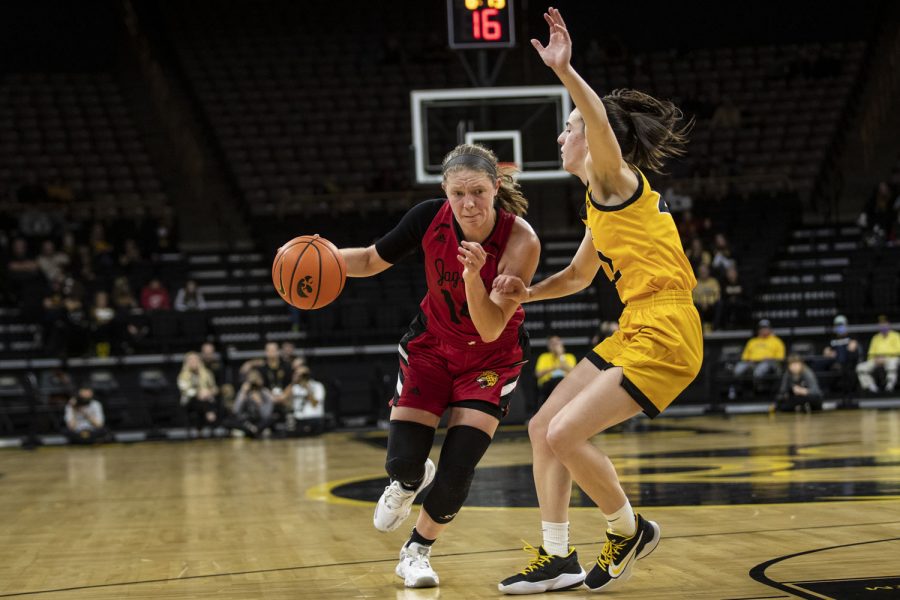 IUPUI guard Rachel McLimore drives to the basket during a women’s basketball game between No. 15 Iowa and Indiana University-Purdue University Indianapolis at Carver-Hawkeye Arena in Iowa City on Tuesday, Dec. 21, 2021. The Jaguars defeated the Hawkeyes 74-73. McLimore had a total of 19 points. 