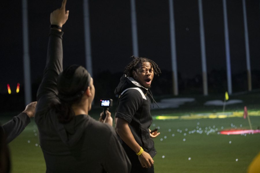 Iowa defensive back Kaevon Merriweather celebrates his swing with defensive back Dane Belton during an event at Topgolf before the 2022 Vrbo Citrus Bowl in Orlando, Fla., on Wednesday, Dec. 29, 2021. Merriweather had one interception in the 2021 season.