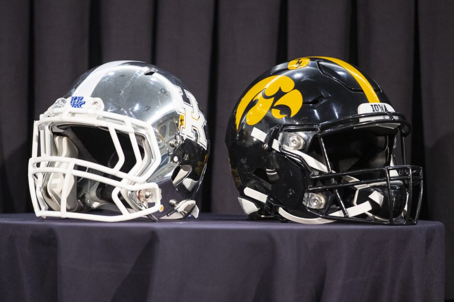 Kentucky and Iowa’s helmets are featured during a press conference for the 2022 Vrbo Citrus Bowl between Iowa and Kentucky at the Rosen Plaza Hotel in Orlando, Fla., on Wednesday, Dec. 29, 2021. The two teams matchup on Saturday, Jan. 1, 2022, at Camping World Stadium in Orlando.