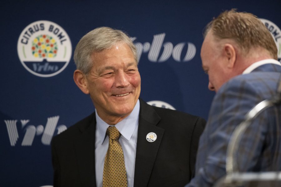 Iowa head coach Kirk Ferentz and Kentucky head coach Mark Stoops laugh with each other after a head coach press conference for the 2022 Vrbo Citrus Bowl at Rosen Plaza Hotel in Orlando, Fla., on Friday, Dec. 31, 2021. The Hawkeyes and the Wildcats will matchup at Camping World Stadium in Orlando on Saturday, Jan. 1, 2022.