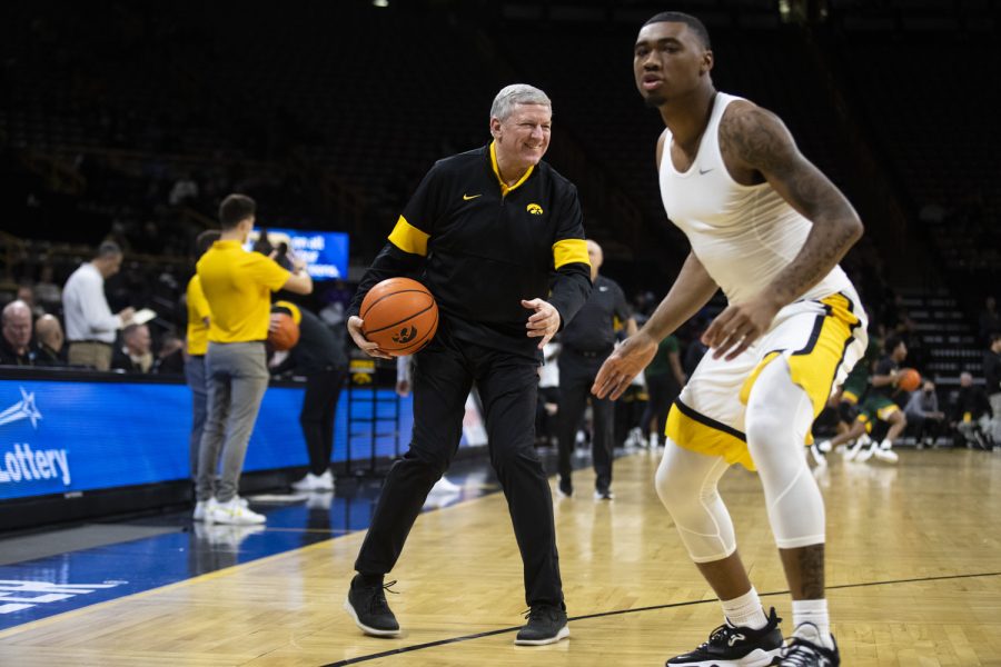 Iowa assistant coach Kirk Speraw practices with players before a basketball game between Iowa and Southeastern Louisiana at Carver-Hawkeye Arena in Iowa City on Tuesday, Dec. 21, 2021. The Hawkeyes defeated the Lions 93-62. 