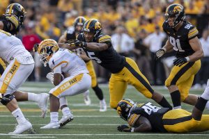 Iowa linebacker Jestin Jacobs makes a tackle during a football game between Iowa and Kent State at Kinnick Stadium on Saturday, Sept. 18, 2021. The Hawkeyes defeated the Golden Flashes with a score of 30-7. 