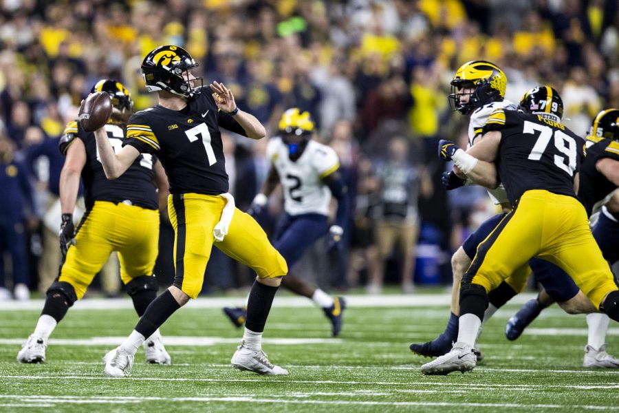 Iowa+quarterback+Spencer+Petras+winds+up+to+pass+during+the+Big+Ten+Championship+game+between+No.+13+Iowa+and+No.+2+Michigan+at+Lucas+Oil+Stadium+in+Indianapolis%2C+Indiana%2C+on+Saturday%2C+Dec.+4%2C+2021.+Petras+threw+for+nine+completions+on+22+attempts.+The+Wolverines+became+Big+Ten+Champions+after+defeating+the+Hawkeyes%2C+42-3.+