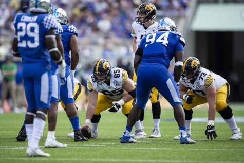 Iowa center Tyler Linderbaum prepares to snap the football during the 2022 Vrbo Citrus Bowl between No. 15 Iowa and No. 22 Kentucky at Camping World Stadium in Orlando, Fla., on Saturday, Jan. 1, 2022. The Wildcats defeated the Hawkeyes, 20-17.