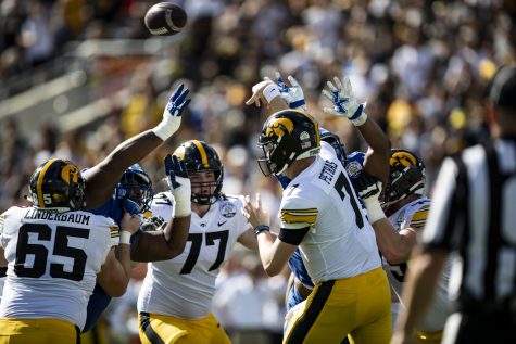 Iowa quarterback Spencer Petras delivers a pass during the 2022 Vrbo Citrus Bowl between No. 15 Iowa and No. 22 Kentucky at Camping World Stadium in Orlando, Fla., on Saturday, Jan. 1, 2022.