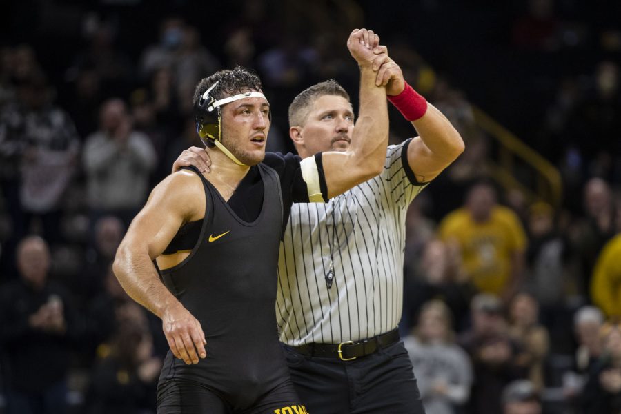 Iowa’s No. 2 174-pound Michael Kemerer celebrates a win over Purdues No. 21 Gerrit Nijenhuis during a wrestling meet between No. 1 Iowa and No. 15 Purdue in Carver-Hawkeye Arena on Sunday, Jan. 9, 2022. The Hawkeyes defeated the Boilermakers, 36-4.