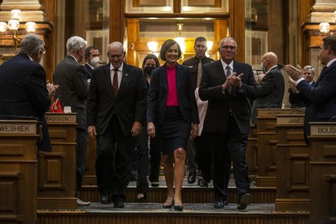 Iowa Gov. Kim Reynolds enters the Iowa House Chamber for the Condition of the State Address on Tuesday, January 11, 2022. (Kelsey Kremer/The Des Moines Register)