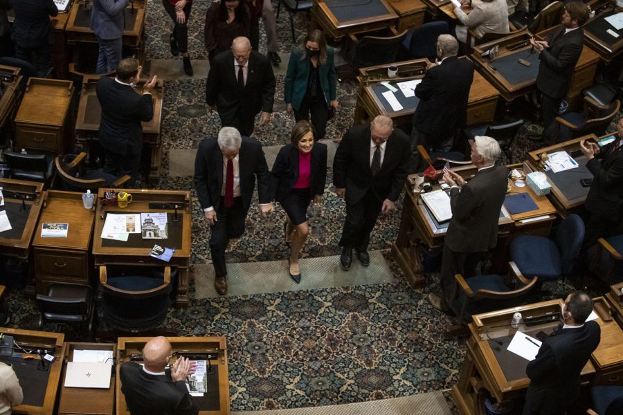 Iowa Governor Kim Reynolds exits the House Chamber during the Condition of the State address at the Iowa State Capitol in Des Moines, Iowa, on Tuesday, Jan. 11, 2022. During the State address, Reynolds spoke about childcare, Iowa teachers, material taught in schools, unemployment, tax cuts, and more.