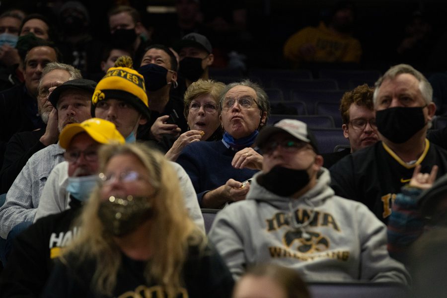 Fans look on during a wrestling dual between No. 2 Iowa and No. 23 Northwestern at Welsh-Ryan Arena in Evanston, Illinois on Friday, Jan. 14, 2022. The Hawkeyes defeated the Wildcats 33-6.
