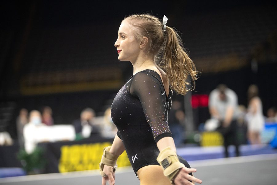 Iowa senior Lauren Guerin performs her floor routine during a gymnastics meet between Iowa and Texas Women’s University at Carver-Hawkeye Arena on Friday, Jan. 14, 2022. Guerin tied for 2nd place with 9.875. The Hawkeyes defeated the Pioneers, 196.125-189.300.