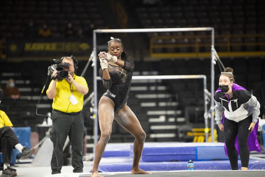 Iowa%E2%80%99s+JerQuavia+Henderson+performs+her+floor+routine+during+a+gymnastics+meet+between+Iowa+and+Texas+Women%E2%80%99s+University+at+Carver-Hawkeye+Arena+on+Friday%2C+Jan.+14%2C+2022.+Henderson+took+first+place+for+her+floor+routine+with+9.900+points.+The+Hawkeyes+defeated+the+Pioneers%2C+196.125-189.300.