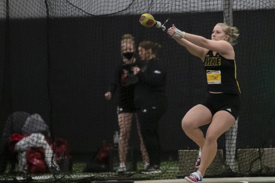 Milwaukees Lauren Lietzke winds up for a shot during the Hawkeye Invitational in the Hawkeye Tennis and Recreational Center on Friday, Jan. 14th, 2022. 