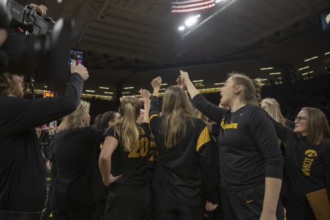 Iowa huddles together after a women’s basketball game between Iowa and Nebraska at Carver-Hawkeye Arena in Iowa City on Sunday, Jan. 16, 2022. The Hawkeyes defeated the Cornhuskers, 93-83.
