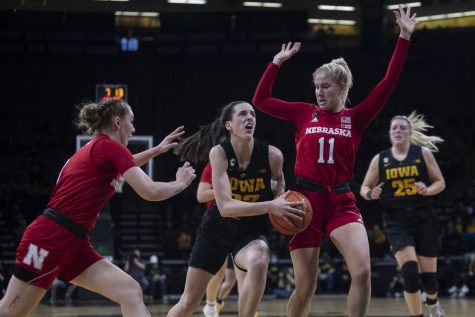 Iowa guard Caitlin Clark drives to the basket during a women’s basketball game between Iowa and Nebraska at Carver-Hawkeye Arena in Iowa City on Sunday, Jan. 16, 2022. Clark finished with 31 points. The Hawkeyes defeated the Cornhuskers, 93-83.