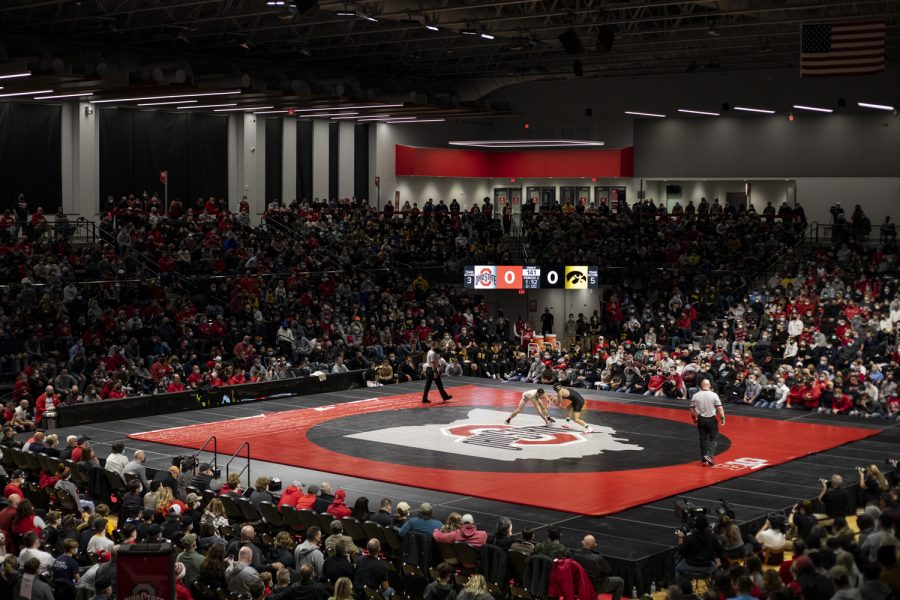 Fans watch the competition during a dual between No. 2 Iowa and No. 6 Ohio State at the Covelli Center in Columbus, OH on Friday, Jan. 21, 2022. The Hawkeyes defeated the Buckeyes 21-12.