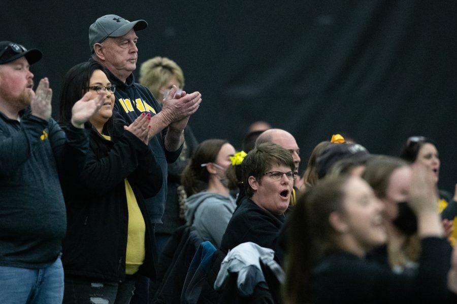 Fans cheer during the mens weight throw at the 2022 Larry Wieczorek Invitational track and field meet at the Hawkeye Tennis and Recreation Center on Friday, Jan. 21, 2022. The Larry Wieczorek Invitational hosted Baylor, Gonzaga, Northern Iowa, Purdue, and Wisconsin.