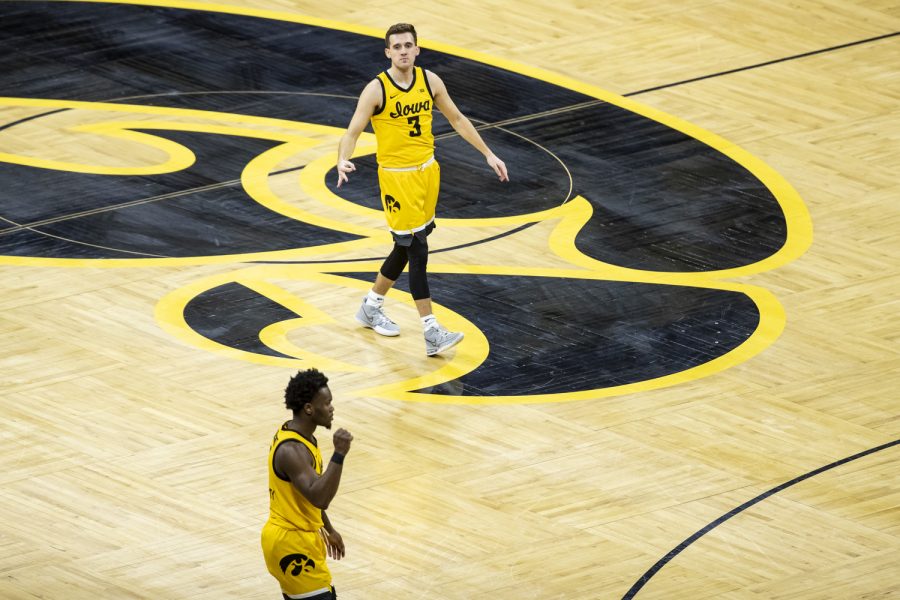 Iowa guard Jordan Bohannon celebrates a 3-point make during a men’s basketball game between Iowa and Penn State at Carver-Hawkeye Arena on Saturday, Jan. 22, 2022. Bohannon shot 3-7 from outside the arc with 11 points. The Hawkeyes defeated the Nittany Lions, 68-51.