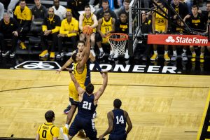 Iowa forward Keegan Murray attempts to dunk during a men’s basketball game between Iowa and Penn State at Carver-Hawkeye Arena on Saturday, Jan. 22, 2022. Murray collected 15 points. The Hawkeyes defeated the Nittany Lions, 68-51.
