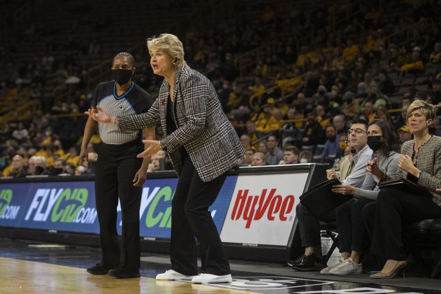 Iowa head coach Lisa Bluder debates with an official during a women’s basketball game between No. 25 Iowa and Illinois at Carver-Hawkeye Arena in Iowa City on Sunday, Jan. 23, 2022. The Hawkeyes defeated the Fighting Illini, 82-56.