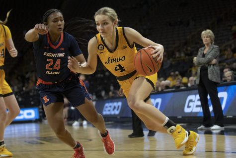 Iowa guard Kylie Feuerbach drives to the basket during a women’s basketball game between Iowa and Illinois at Carver-Hawkeye Arena in Iowa City on Sunday, Jan. 23, 2022. Feuerbach scored 10 points. The Hawkeyes defeated the Fighting Illini, 82-56.