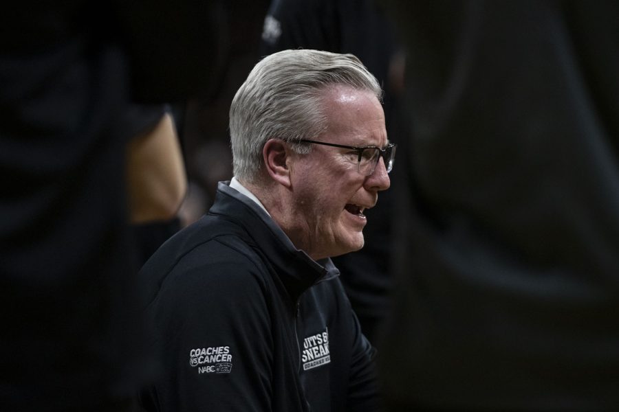 Iowa head coach Fran McCaffery speaks with his team during a timeout of a basketball game between Iowa and No. 6 Purdue at Carver-Hawkeye Arena in Iowa City on Thursday, Jan. 27, 2022. The Boilermakers defeated the Hawkeyes, 83-73. Iowa scored 33 points in the first half.