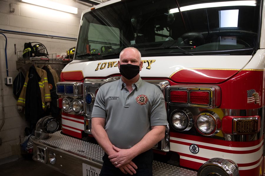 Iowa+City+Fire+Marshall+Brian+Greer+poses+in+front+of+a+fire+truck+at+the+Iowa+City+Fire+Station+1+Headquarters+on+Jan.+18+2022.
