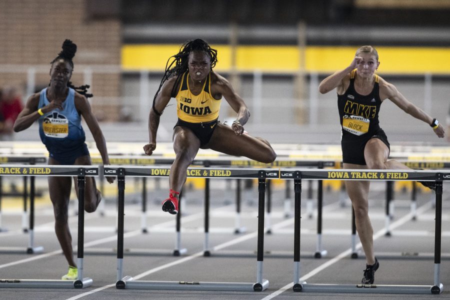 Iowa’s Myreanna Bebe leads the 60-meter hurdles during the 2022 Hawkeye Invitational track and field meet at the University of Iowa Recreation Building on Saturday, Jan. 15, 2022. Bebe set a personal record with a time of 8.30 to put her No. 4 all-time for the Hawkeyes. The Hawkeye Invitational hosted Arkansas State, Bradley, Hawkeye Community College, Indian Hills Community College, Iowa Central Community College, Loyola-Chicago, Northern Iowa, South Dakota, UW-Milwaukee, and Western Illinois.