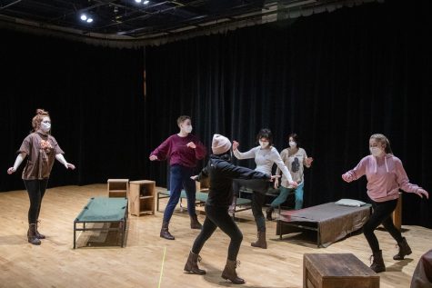 Actors perform during warmups of “England’s Splendid Daughters,” in the University of Iowa’s Theatre Building on Tuesday, Jan. 25, 2022.
