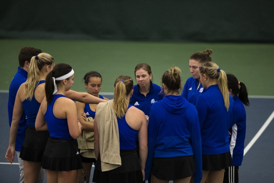 Drake players huddle up after a tennis match between Iowa and Drake at Hawkeye Tennis and Recreation Complex in Iowa City on Sunday, Jan. 16, 2022. Iowa beat Drake, 6-1.