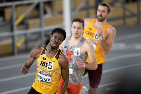 Iowa sprinter Wayne Lawrence Jr. leads the pack in the 400m dash premier during the second day of the Larry Wieczorek Invitational on Saturday, Jan. 23, 2021 at the University of Iowa Recreation Building. Lawrence won with a time of 46.28. Due to coronavirus restrictions, the Hawkeyes could only host Big Ten teams. Iowa men took first, scoring 189, and women finished third with 104 among Minnesota, Wisconsin, Nebraska, and Illinois. 