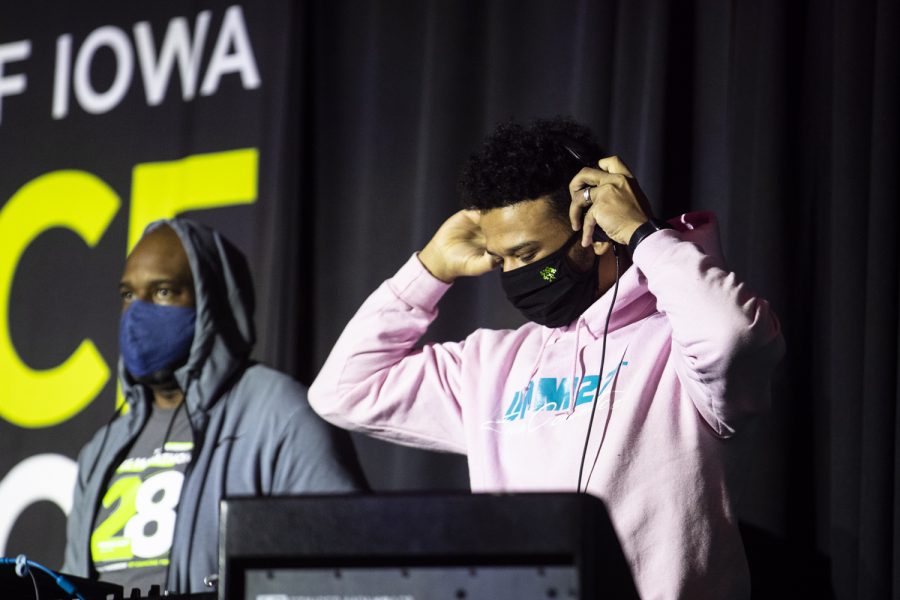 A DJ puts on headphones during Dance Marathon at the Iowa Memorial Union at the University of Iowa in Iowa City on Saturday, Feb. 5, 2022. The fundraiser was held virtually with limited in-person participants. 