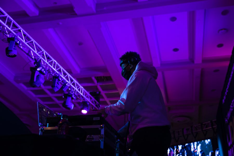 A DJ adjusts the music during Dance Marathon at the Iowa Memorial Union at the University of Iowa in Iowa City on Saturday, Feb. 5, 2022. The fundraiser was held virtually with limited in-person participants. 