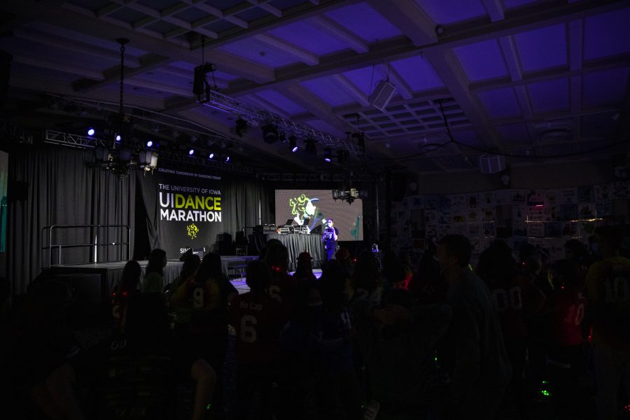 Participants listen to Dance Marathon Executive Director Anna Dodge during Dance Marathon at the Iowa Memorial Union at the University of Iowa in Iowa City on Saturday, Feb. 5, 2022. The fundraiser was held virtually with limited in-person participants. 