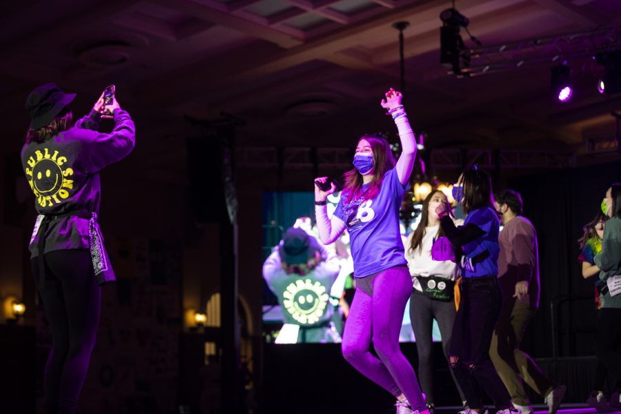 A participant takes a picture of another participant during Dance Marathon at the Iowa Memorial Union at the University of Iowa in Iowa City on Saturday, Feb. 5, 2022. The fundraiser was held virtually with limited in-person participants. 