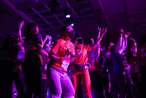 Participants dance during Dance Marathon at the Iowa Memorial Union at the University of Iowa in Iowa City on Saturday, Feb. 5, 2022. The fundraiser was held virtually with limited in-person participants. 