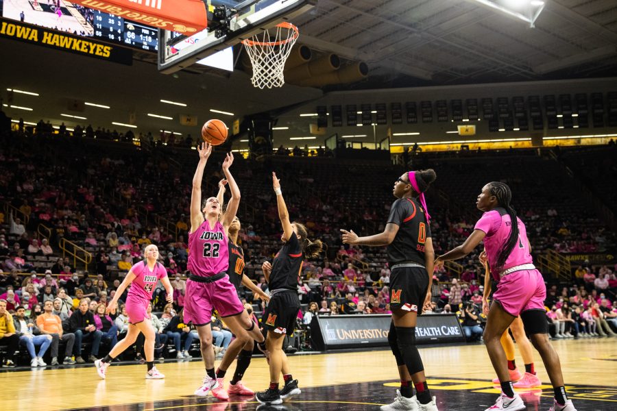 Iowa point guard Caitlin Clark shoots the ball during a basketball game between No. 22 Iowa and No. 13 Maryland at Carver-Hawkeye Arena in Iowa City on Monday, Feb. 14, 2022. Clark scored 19 points. The Terrapins beat the Hawkeyes, 81-69.
