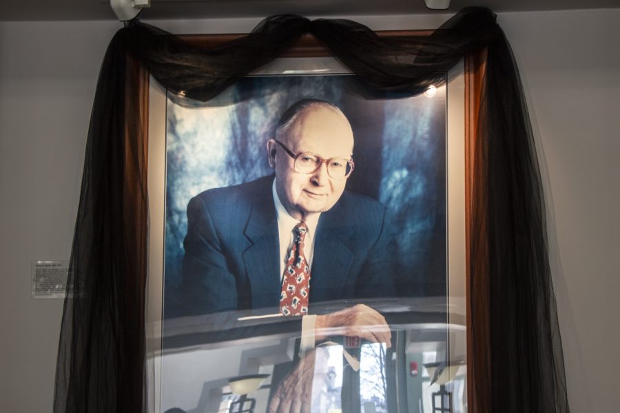 A veil hangs over a portrait to memorialize Henry B. Tippie in the Tippie College of Business at the University of Iowa on Monday, Feb. 21, 2022. Henry B. Tippie died at the age of 95 on Sunday, Feb. 20, 2022.