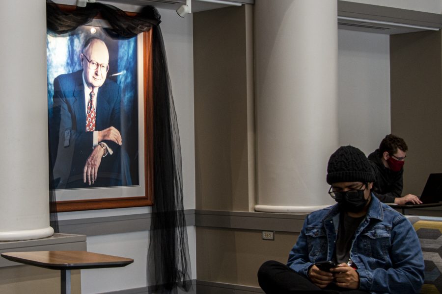 A veil hangs over a portrait to memorialize Henry B. Tippie in the Tippie College of Business at the University of Iowa on Monday, Feb. 21, 2022. Henry B. Tippie died at the age of 95 on Sunday, Feb. 20, 2022.