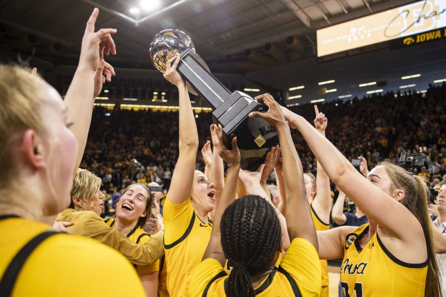 Iowa+celebrates+its+regular+season+Big+Ten+Champion+title+after+a+women%E2%80%99s+basketball+game+between+No.+21+Iowa+and+No.+6+Michigan+at+Carver-Hawkeye+Arena+on+Sunday%2C+Feb.+27%2C+2022.+The+Hawkeyes+became+Big+Ten+Champions+after+defeating+the+Wolverines%2C+104-80.