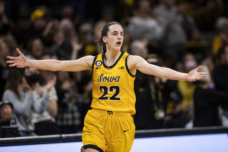 Iowa guard Caitlin Clark celebrates during a women’s basketball game between No. 21 Iowa and No. 6 Michigan at Carver-Hawkeye Arena on Sunday, Feb. 27, 2022. The Hawkeyes became regular season Big Ten co-Champions after defeating the Wolverines, 104-80. In a press conference following the game, Clark spoke on her excitement when her teammates scored. “I was just passing it to them and they were knocking it down,” Clark said. “And I was running back celebrating every time so thats pretty fun.”