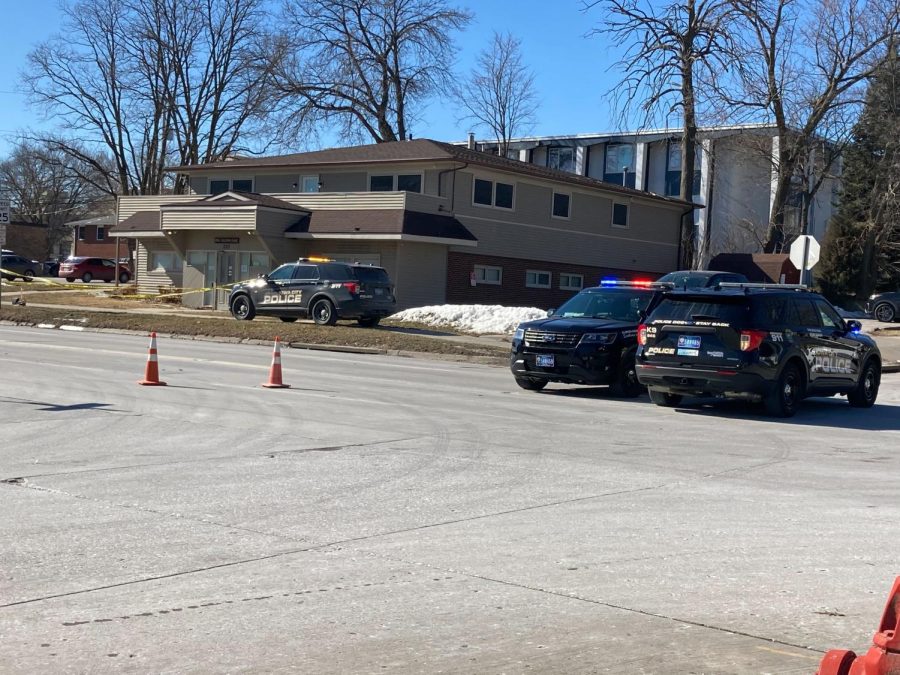 Police cars are seen blocking an area outside the Emma Goldman Clinic on Friday, Feb. 18, 2022. Police reported a suspicious package in the area. 