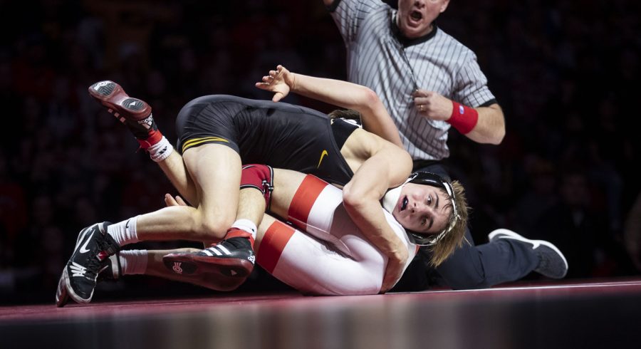 Iowa’s No. 12 125-pound Drake Ayala wrestles Nebraska’s Jeremiah Reno during a wrestling dual between No. 2 Iowa and No. 10 Nebraska at the Bob Devany Center in Lincoln, NE on Sunday, Feb 20, 2022. Ayala defeated Reno by decision 13-6. The Hawkeyes defeated the Cornhuskers 20-15 in their final regular season dual.
